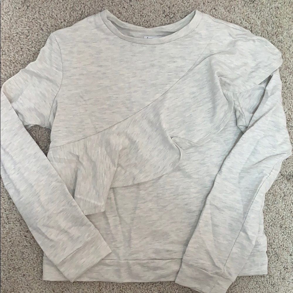 Ruffle long sleeve shirt/sweater.